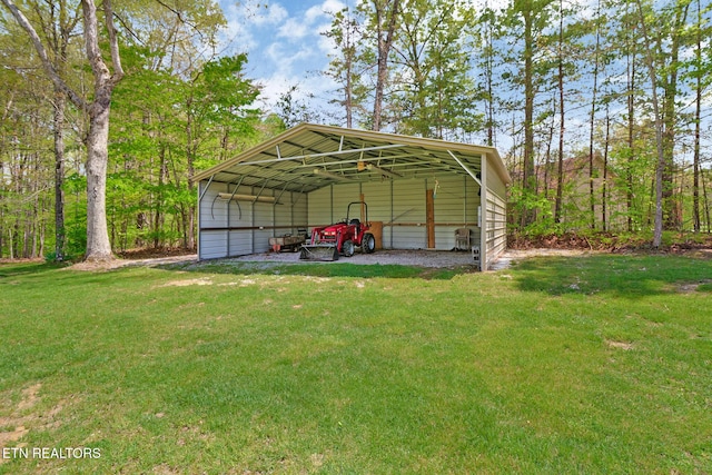 view of outbuilding with a detached carport