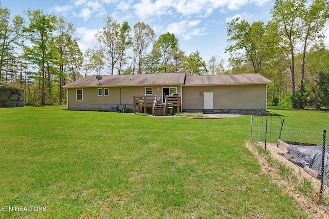 rear view of property featuring a yard, central AC, a deck, and crawl space