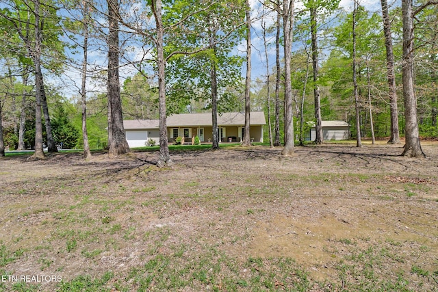 view of front of property with a garage