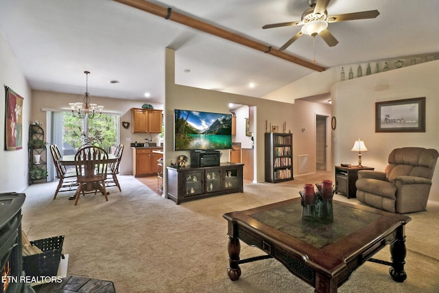 living area featuring visible vents, light colored carpet, lofted ceiling with beams, and ceiling fan with notable chandelier