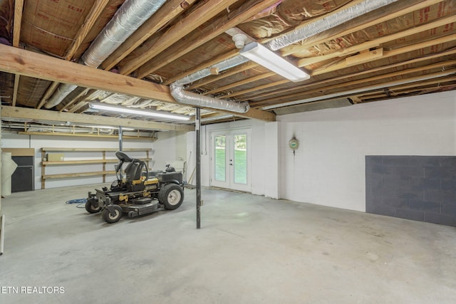 basement featuring concrete block wall