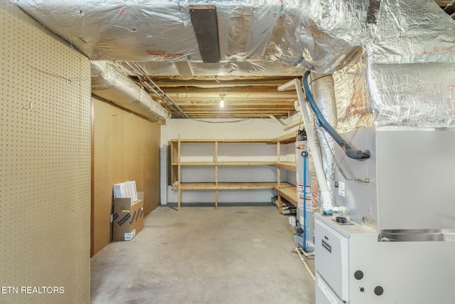 unfinished basement with water heater