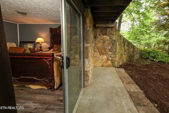 exterior space featuring stone siding