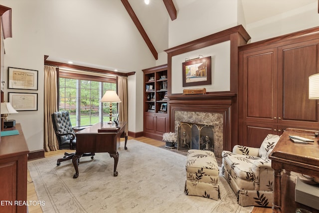 5315 Bent River Blvd, Knoxville, TN 37919 - home office featuring light wood-style floors, a fireplace, beamed ceiling, baseboards, and high vaulted ceiling