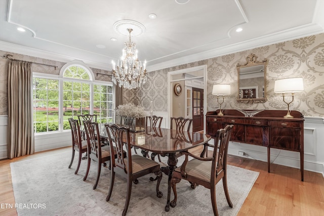 5315 Bent River Blvd, Knoxville, TN 37919 - dining room featuring wallpapered walls, crown molding, light wood-type flooring, a chandelier, and a wainscoted wall