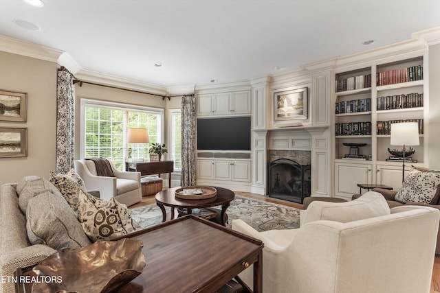 5315 Bent River Blvd, Knoxville, TN 37919 - living area featuring wood finished floors, ornamental molding, a high end fireplace, and recessed lighting