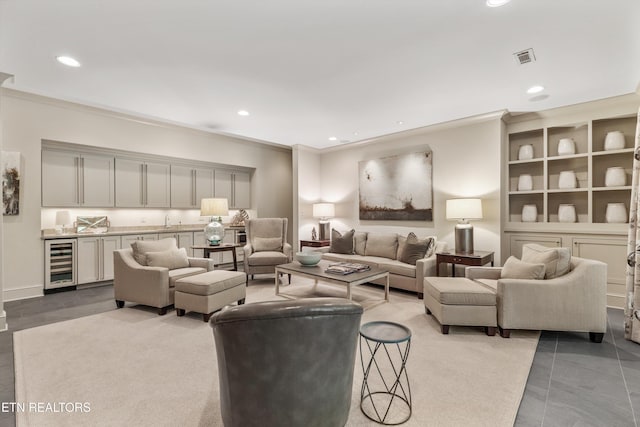 5315 Bent River Blvd, Knoxville, TN 37919 - living room with beverage cooler, crown molding, recessed lighting, and wet bar