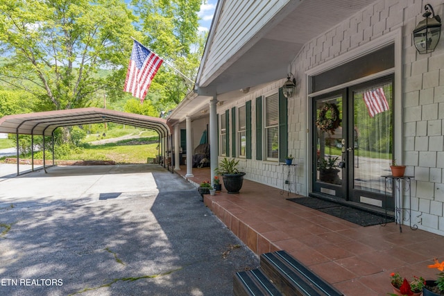 702 Meadowview Dr, Harriman, TN 37748 - exterior space featuring a carport and aphalt driveway