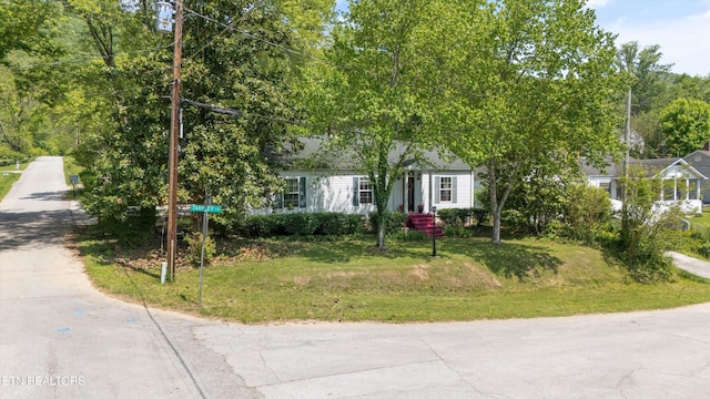 702 Meadowview Dr, Harriman, TN 37748 - view of property hidden behind natural elements featuring a front lawn
