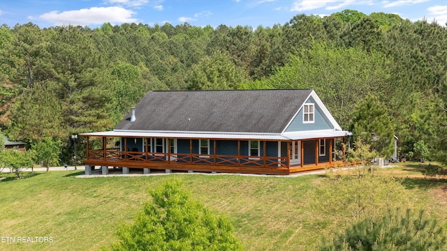 487 Fish Hatchery Rd, Sweetwater, TN 37874 - view of front facade featuring a front yard, a view of trees, and covered porch