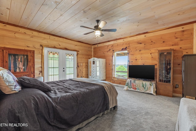 487 Fish Hatchery Rd, Sweetwater, TN 37874 - bedroom featuring multiple windows, carpet flooring, wooden ceiling, wood walls, and french doors