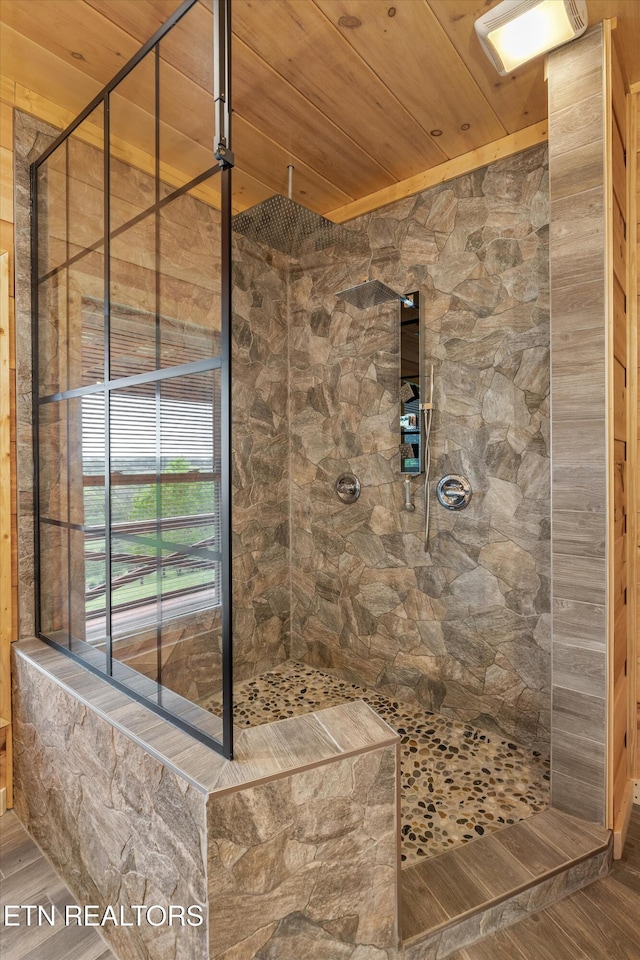 487 Fish Hatchery Rd, Sweetwater, TN 37874 - full bathroom featuring a tile shower, wood finished floors, and wooden ceiling
