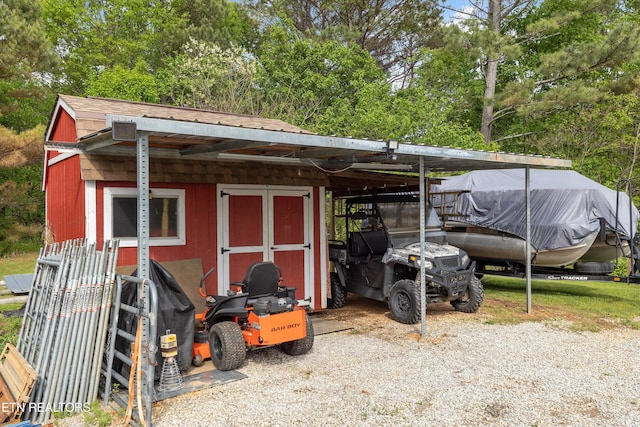 487 Fish Hatchery Rd, Sweetwater, TN 37874 - view of shed with view of wooded area