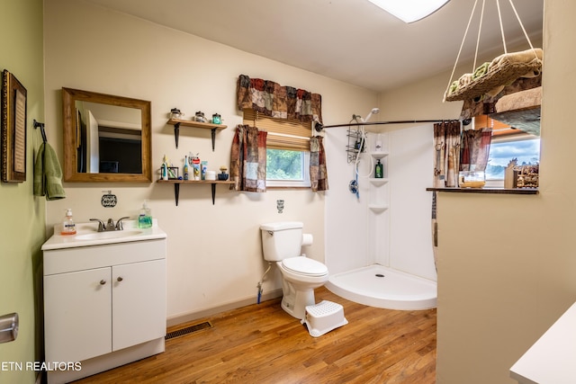 172 W Hills Rd, Rutledge, TN 37861 - full bathroom with toilet, a stall shower, wood finished floors, vanity, and baseboards