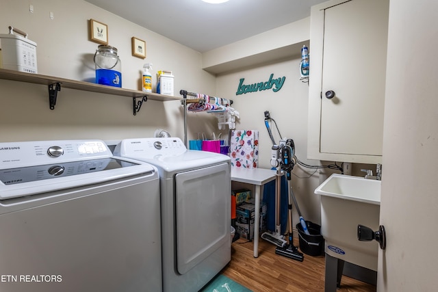172 W Hills Rd, Rutledge, TN 37861 - clothes washing area featuring independent washer and dryer and wood finished floors