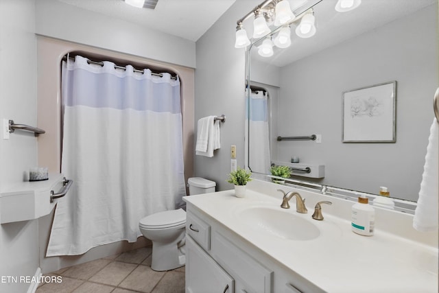full bathroom featuring tile patterned flooring, toilet, and vanity