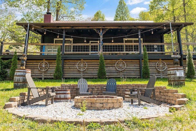 exterior space featuring a fire pit