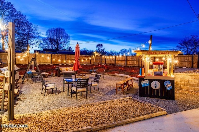 view of patio / terrace with a fenced backyard and outdoor dining space