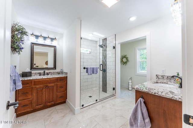 bathroom featuring a stall shower, vanity, baseboards, marble finish floor, and recessed lighting