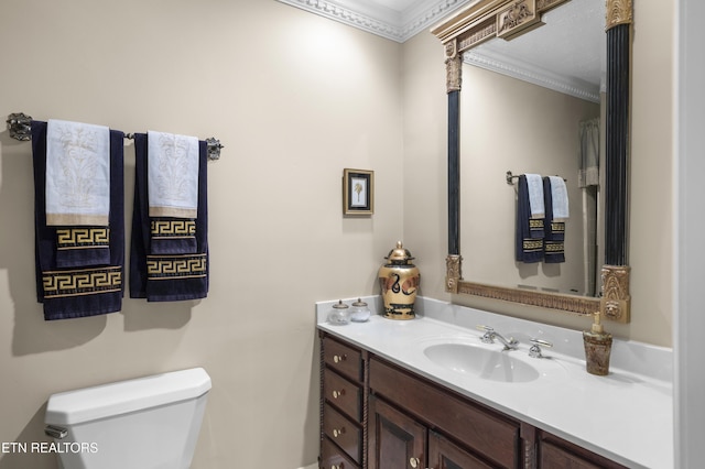145 Lynn Ave, Jellico, TN 37762 - bathroom featuring crown molding, vanity, and toilet