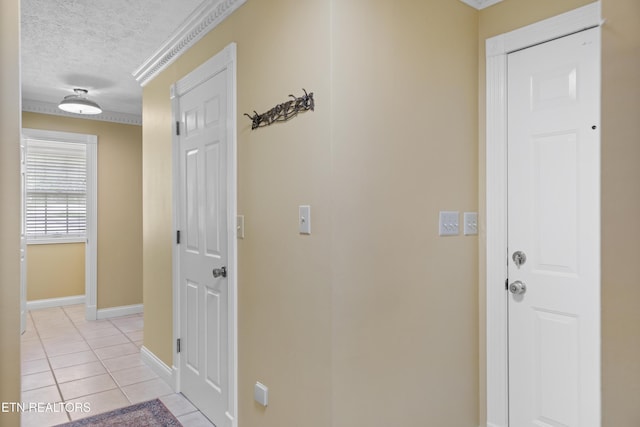 145 Lynn Ave, Jellico, TN 37762 - hall featuring light tile patterned floors, baseboards, and a textured ceiling