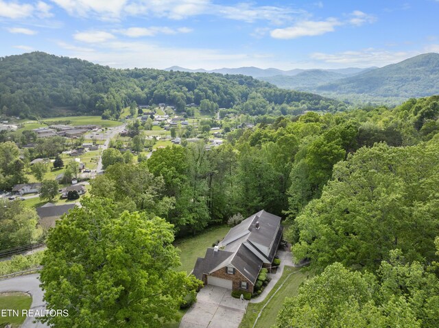 145 Lynn Ave, Jellico, TN 37762 - birds eye view of property featuring a mountain view and a forest view
