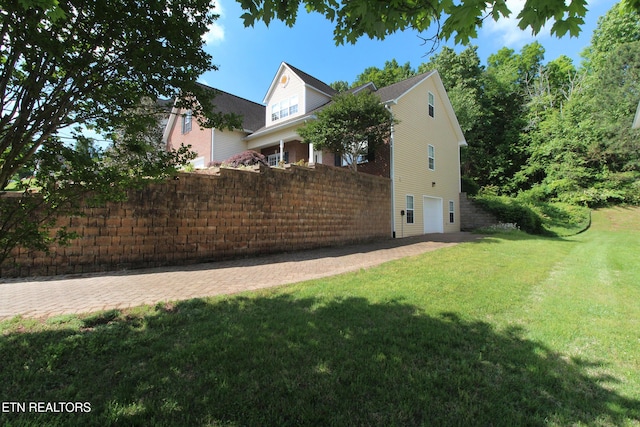 13177 Clear Ridge Rd, Knoxville, TN 37922 - view of side of home featuring a yard