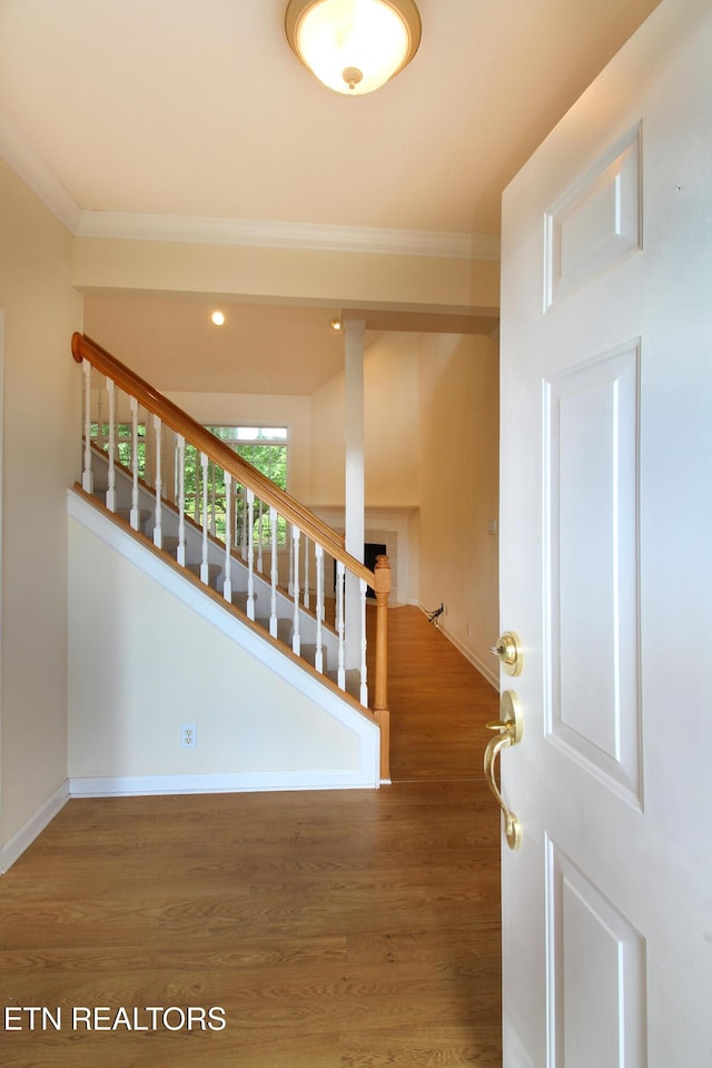 13177 Clear Ridge Rd, Knoxville, TN 37922 - staircase featuring crown molding, wood finished floors, and baseboards