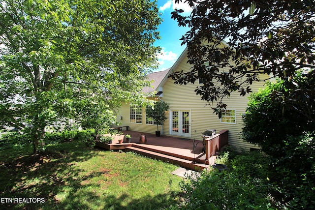13177 Clear Ridge Rd, Knoxville, TN 37922 - back of property with a deck, french doors, and a lawn