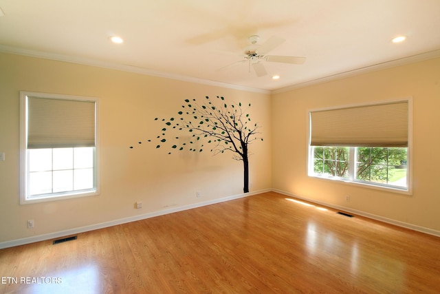 13177 Clear Ridge Rd, Knoxville, TN 37922 - spare room with crown molding, wood finished floors, baseboards, ceiling fan, and recessed lighting