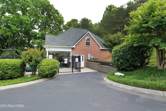 13177 Clear Ridge Rd, Knoxville, TN 37922 - view of property's community featuring driveway, fence, and a gate