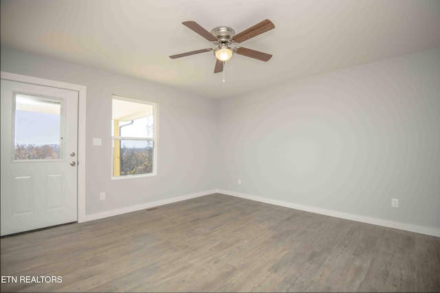 3336 Wimpole Ave, Knoxville, TN 37914 - spare room featuring baseboards, ceiling fan, and wood finished floors