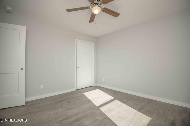 3336 Wimpole Ave, Knoxville, TN 37914 - unfurnished room featuring baseboards, ceiling fan, and wood finished floors