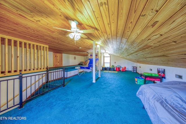 carpeted bedroom featuring wooden ceiling and lofted ceiling