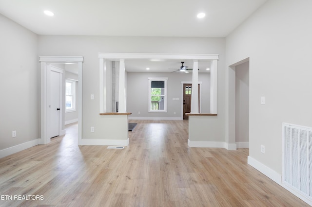 unfurnished living room with visible vents, recessed lighting, light wood finished floors, and ceiling fan