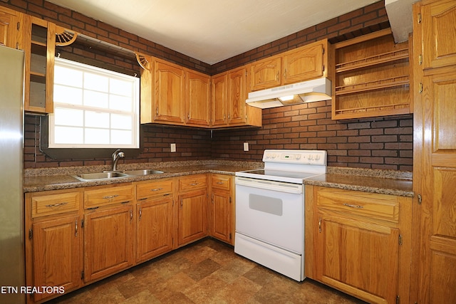 kitchen with glass insert cabinets, a sink, open shelves, electric stove, and under cabinet range hood