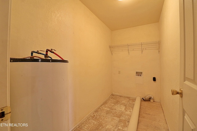 laundry area featuring laundry area, water heater, washer hookup, and electric dryer hookup