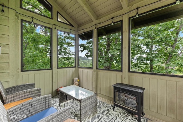 620 Hawk View Dr, Townsend, TN 37882 - sunroom / solarium featuring healthy amount of natural light and a wood stove