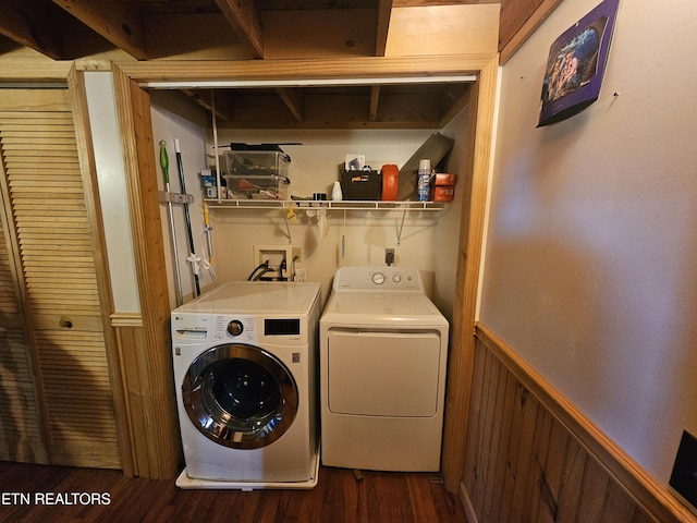 728 Essary Rd, Tazewell, TN 37879 - laundry room with washing machine and clothes dryer, a wainscoted wall, and dark wood-type flooring