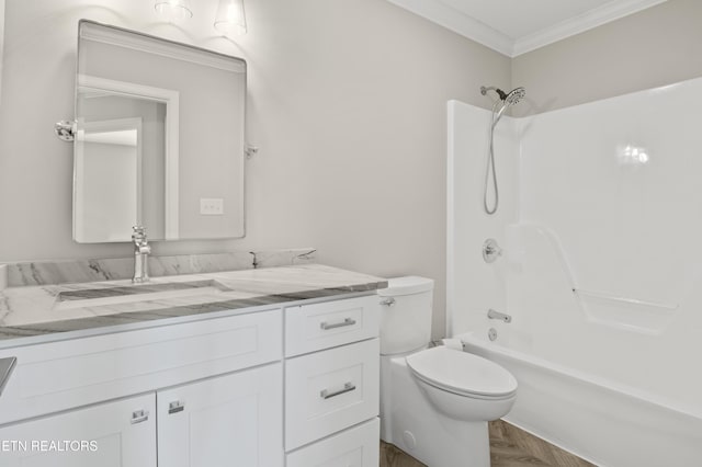 bathroom featuring vanity, ornamental molding, toilet, and shower / tub combination