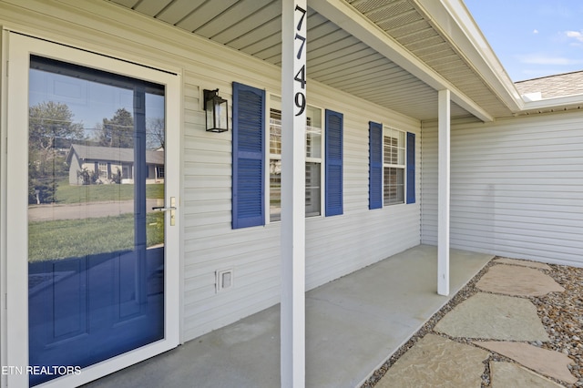 property entrance with a porch