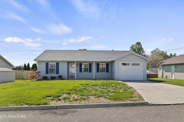 ranch-style home featuring a garage, a front lawn, fence, a shingled roof, and driveway