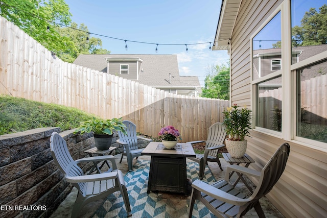 view of patio with fence