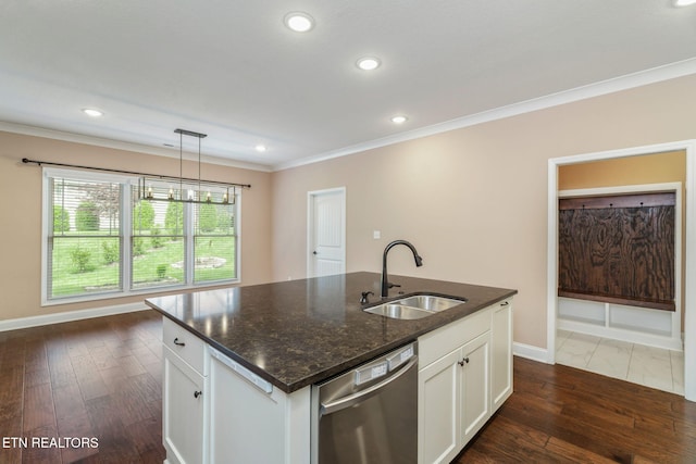 kitchen with ornamental molding, dark wood-style flooring, white cabinets, a sink, and dishwasher