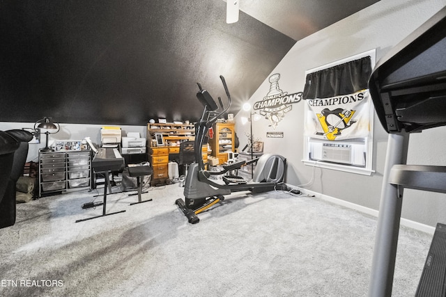 workout area featuring carpet, baseboards, cooling unit, and vaulted ceiling