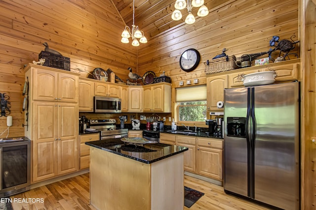 1551 Mountain Dreams Way, Sevierville, TN 37862 - kitchen featuring a sink, light brown cabinets, a chandelier, stainless steel appliances, and wine cooler