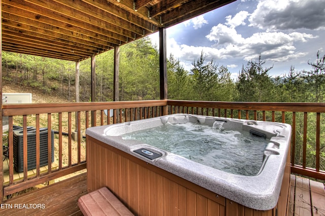 1551 Mountain Dreams Way, Sevierville, TN 37862 - deck featuring a hot tub and central AC unit