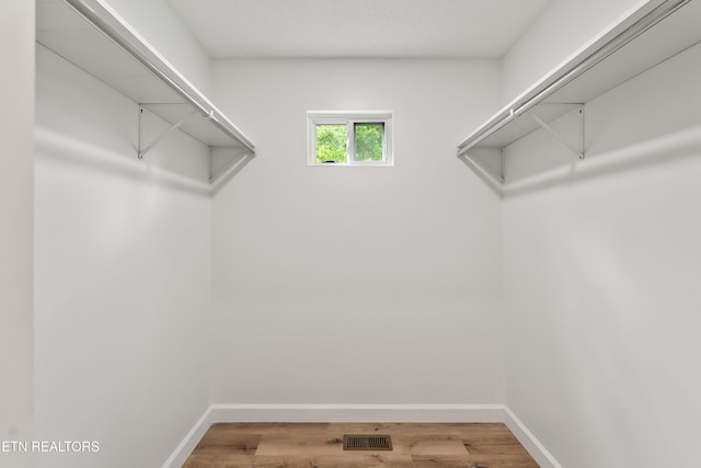 260 Yonside Dr, Sparta, TN 38583 - spacious closet featuring visible vents and wood finished floors