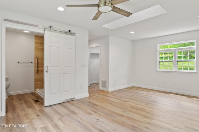 260 Yonside Dr, Sparta, TN 38583 - unfurnished bedroom with visible vents, light wood-style floors, baseboards, recessed lighting, and a spacious closet