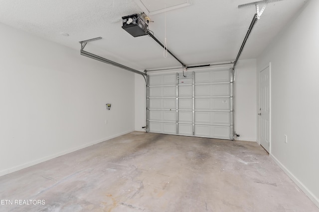 260 Yonside Dr, Sparta, TN 38583 - garage with baseboards and a garage door opener
